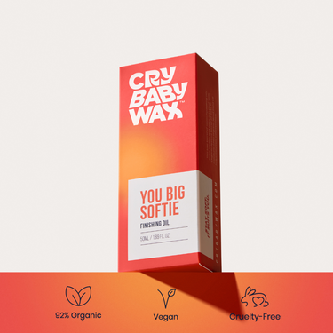 You Big Softie Finishing Oil box in coral packaging, 92% organic, vegan, and cruelty-free post-wax oil